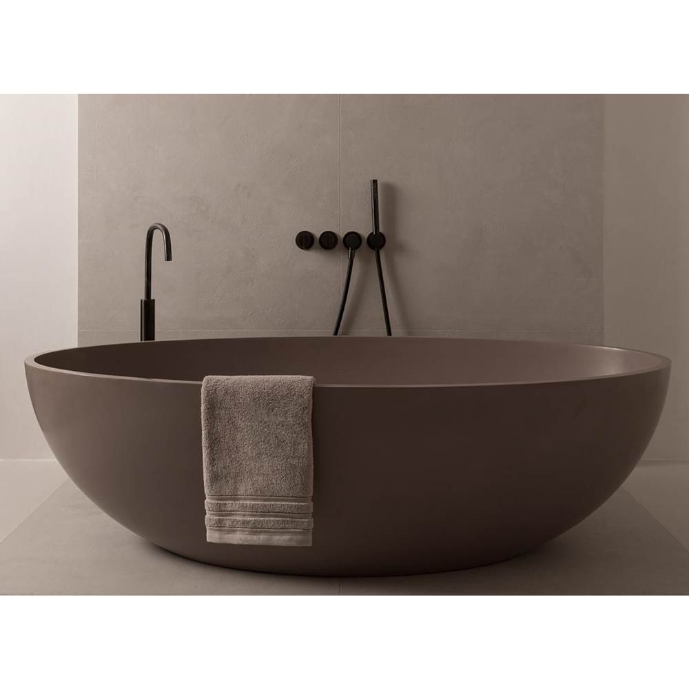 COCOON Atlantis Free-Standing Tub Casted From Solid Surface In Earth.