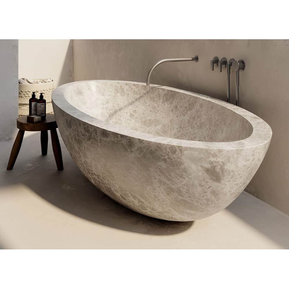 COCOON Tulum Free-Standing Bathtub. Available In Natural Stone; Includes Recessed Drain In Same Material.